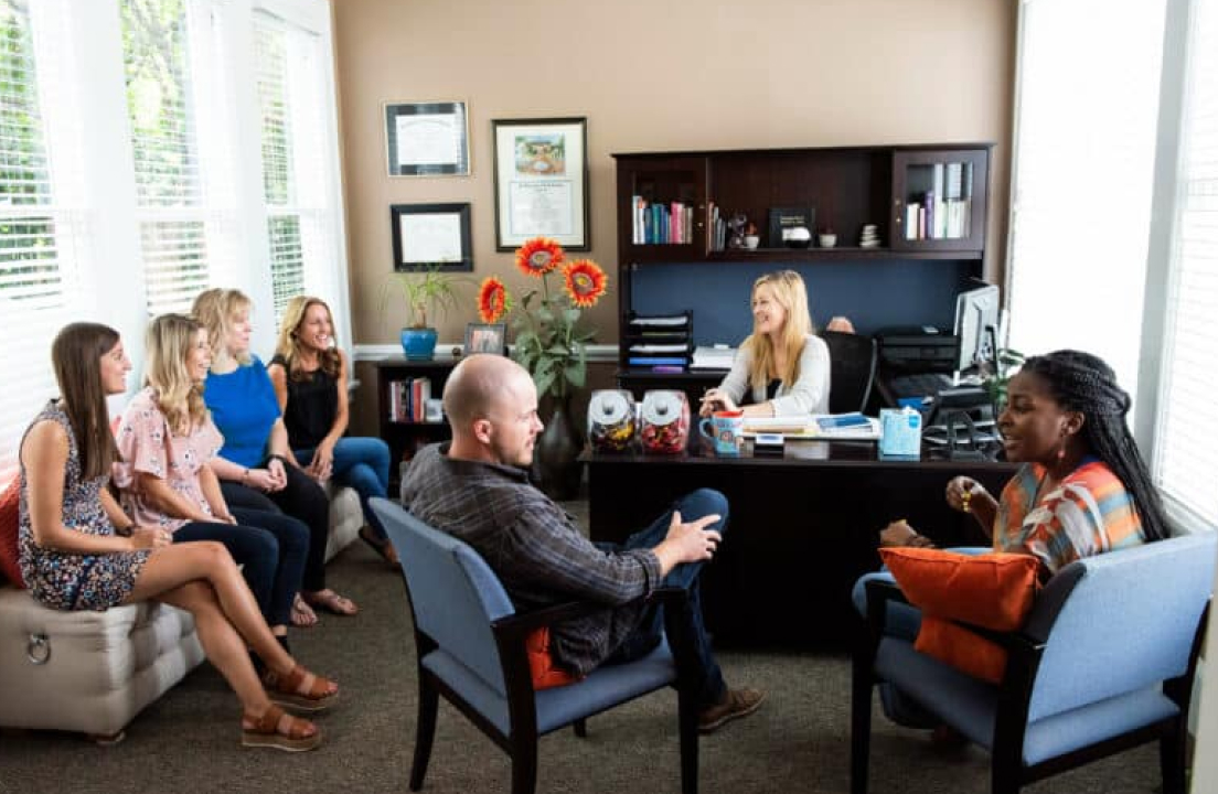 Dilworth staff in a meeting room