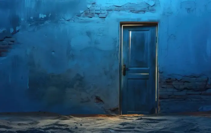 A blue door in a dimly lit room, representing the hidden signs of meth addiction and the path to recovery.